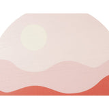 Tableau coucher de soleil accroché dans un salon moderne