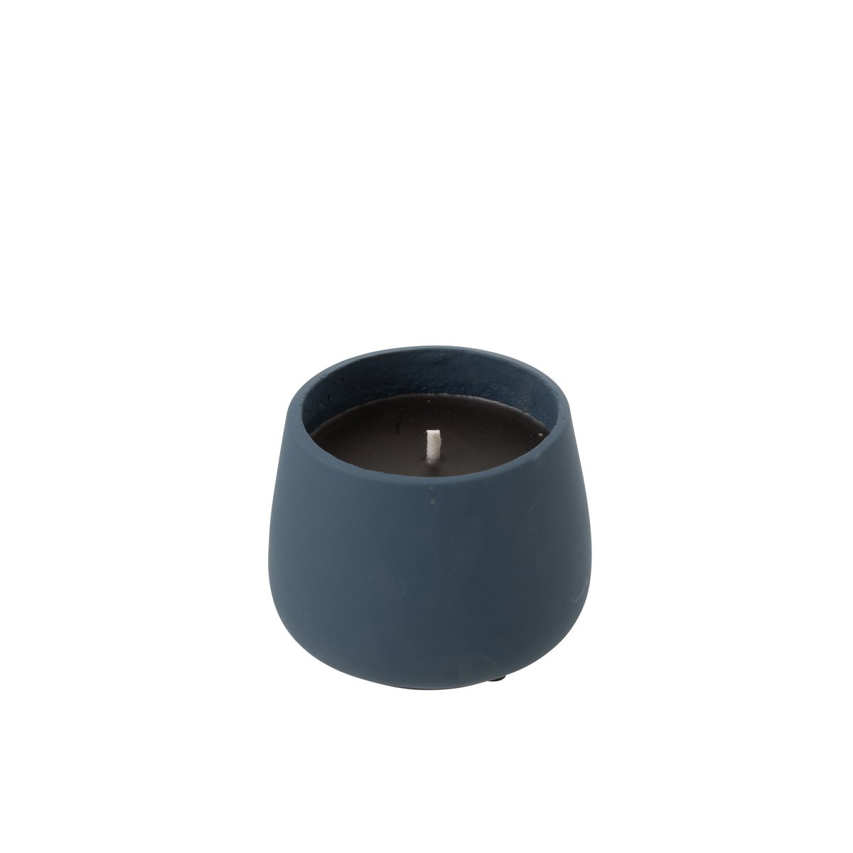 Bougie Cyra en ciment bleu sur un fond naturel