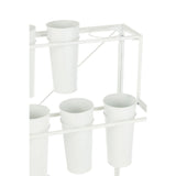 Jardinière J-Line en métal blanc dans un jardin, ambiance chic