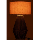 Ambiance cosy avec la lampe Striing J-Ligne dans un salon