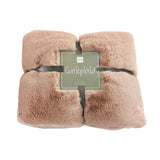 Plaid J-Line rose clair plié sur une chaise