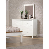 Commode en bois blanc dans une chambre élégante
