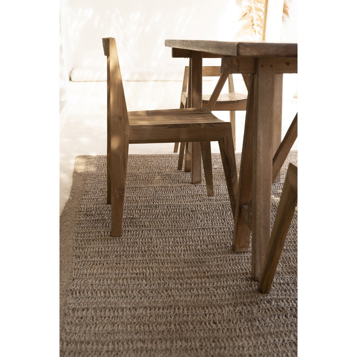 Ambiance chaleureuse avec chaise Paxi en extérieur