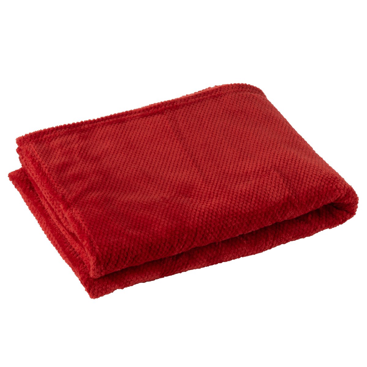 Couverture J-Line Snuggle drapée sur un canapé moderne