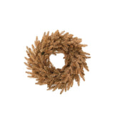 Couronne décorative J-Line en or, mise en scène dans un intérieur élégant