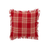Coussin J-Line à carreaux dans une chambre élégante