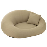 Matelas beignet beige J-Line en extérieur sous le soleil