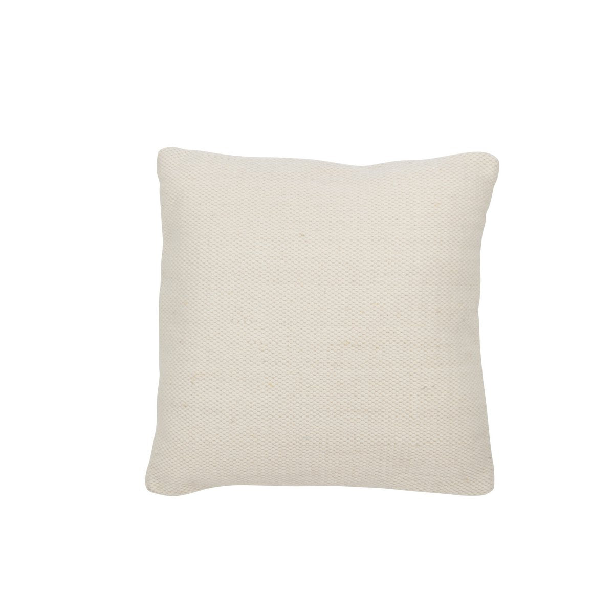 Coussin J-Line en laine crème, vue en perspective sur un canapé