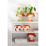Vue latérale du pot de fleurs J-Line en céramique orange