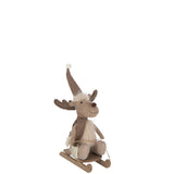 Figurine J-Line Eland Sledge beige dans un intérieur élégant