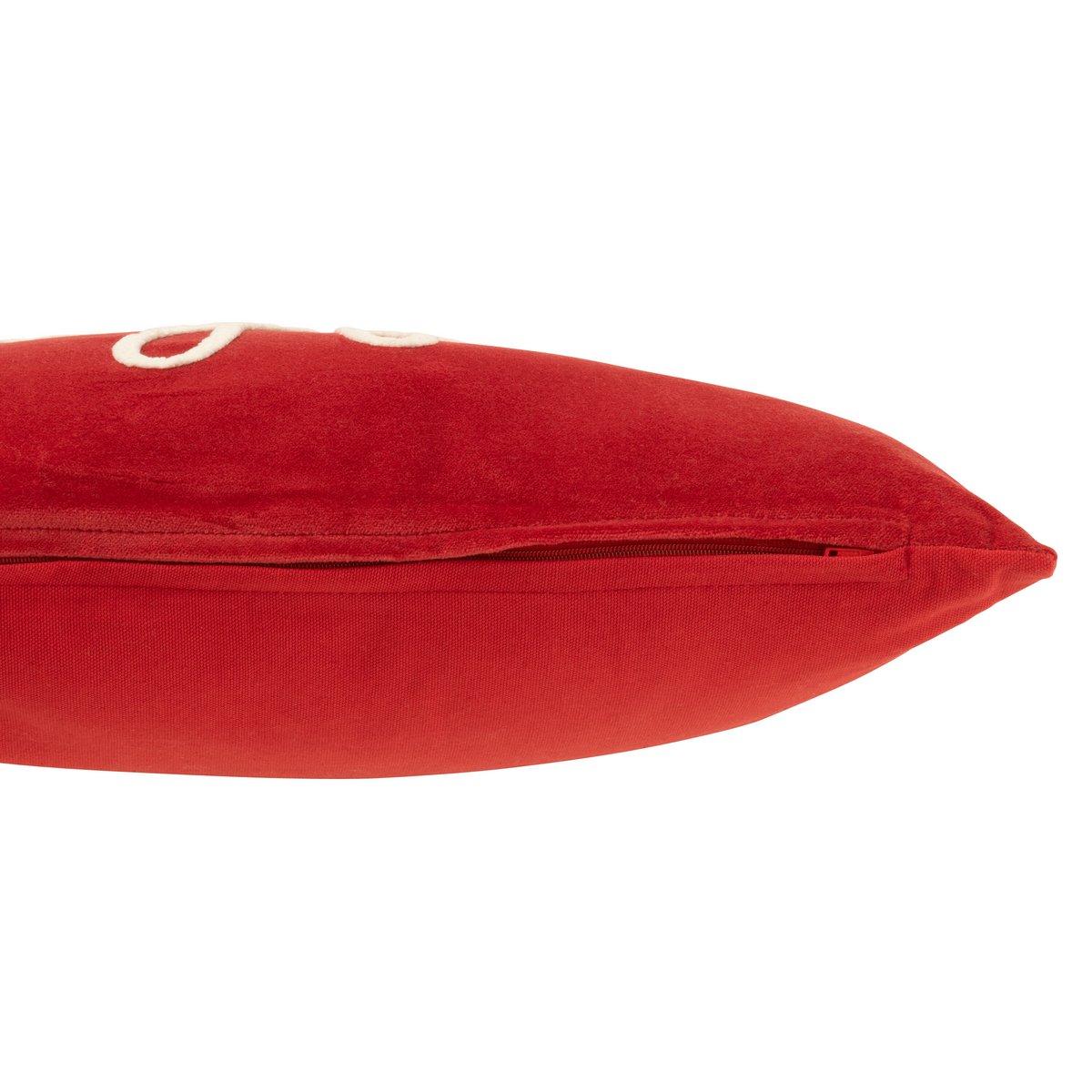 Coussin Joyful sur un lit avec une décoration raffinée