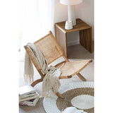 Détail des matériaux du fauteuil Ploistoel, rotin et teck