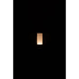 Lampe J-Line Woa sur une table moderne, ambiance cosy