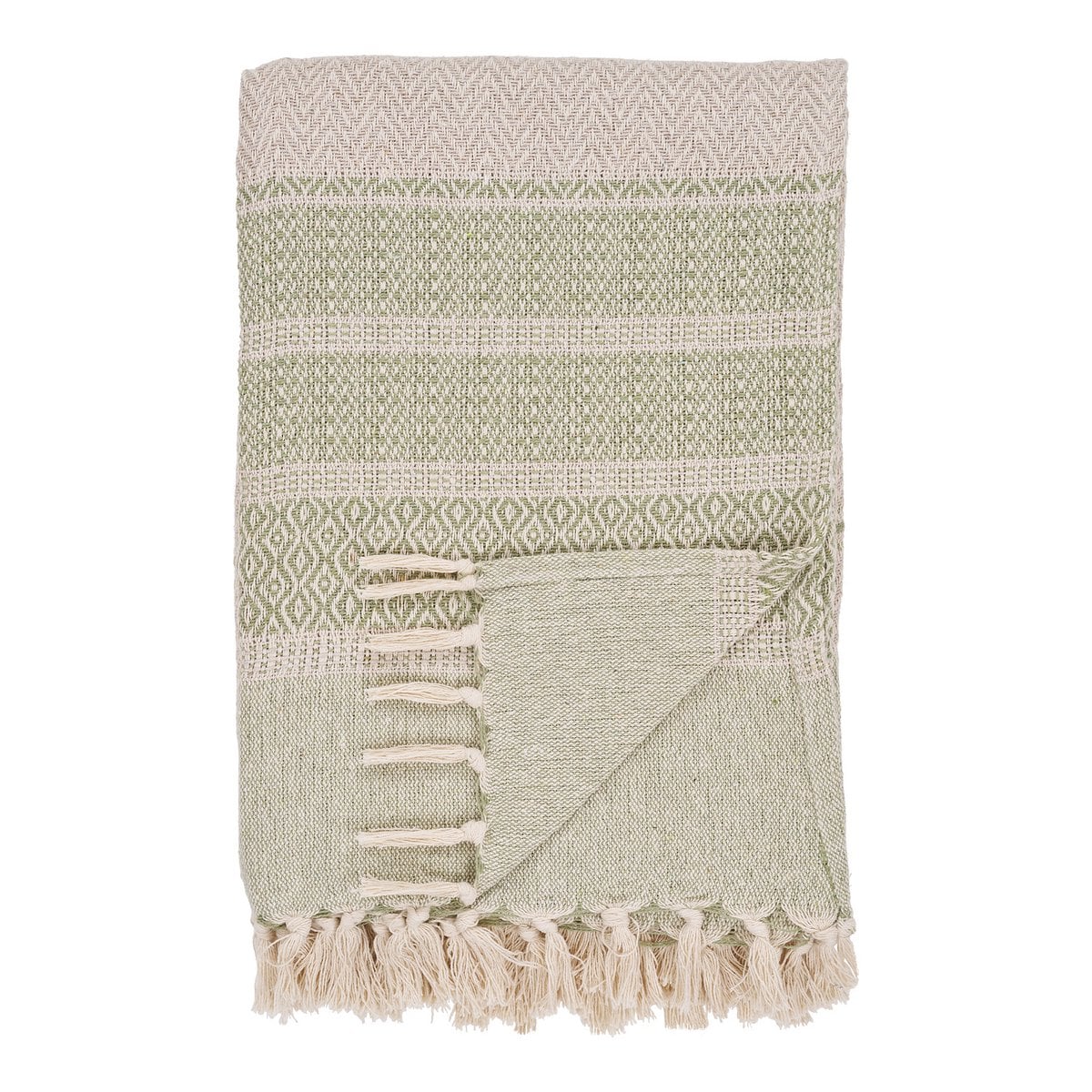 Plaid Manisa vert et beige sur canapé, texture douce et élégante