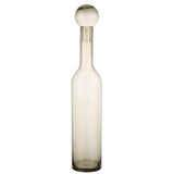 Vue de profil de la bouteille déco Norma en verre gris