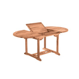 Table de jardin ronde en teck sur une terrasse