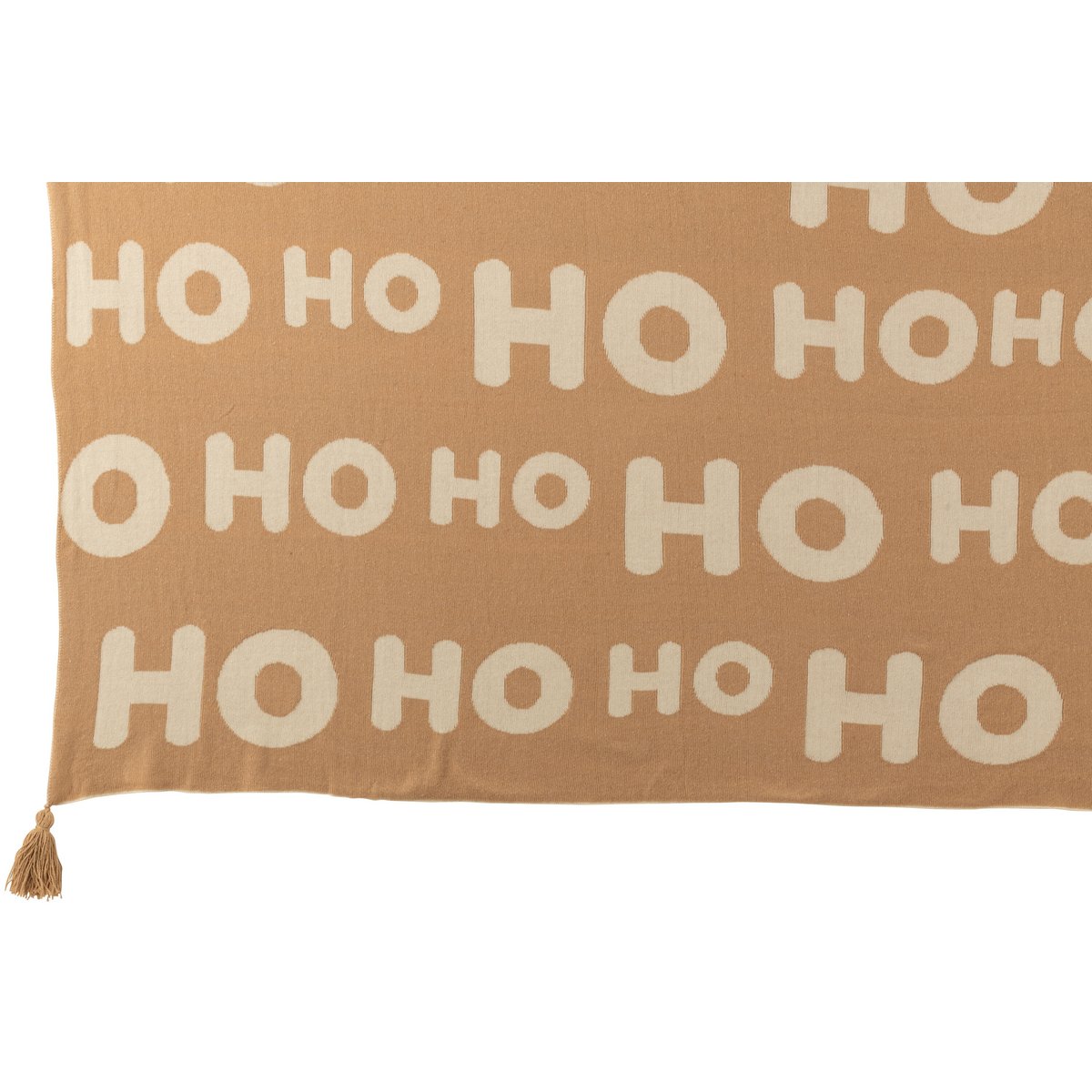 Couverture J-Line Hohoho drapée sur un canapé moderne