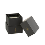 Détail de la bougie parfumée J-Line Noa, verre vert élégant