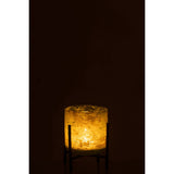 Lanterne J-Line Standing Marble illuminée, créant une ambiance chaleureuse