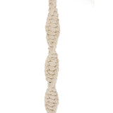 Détail du tissu en coton beige de la balançoire Boho