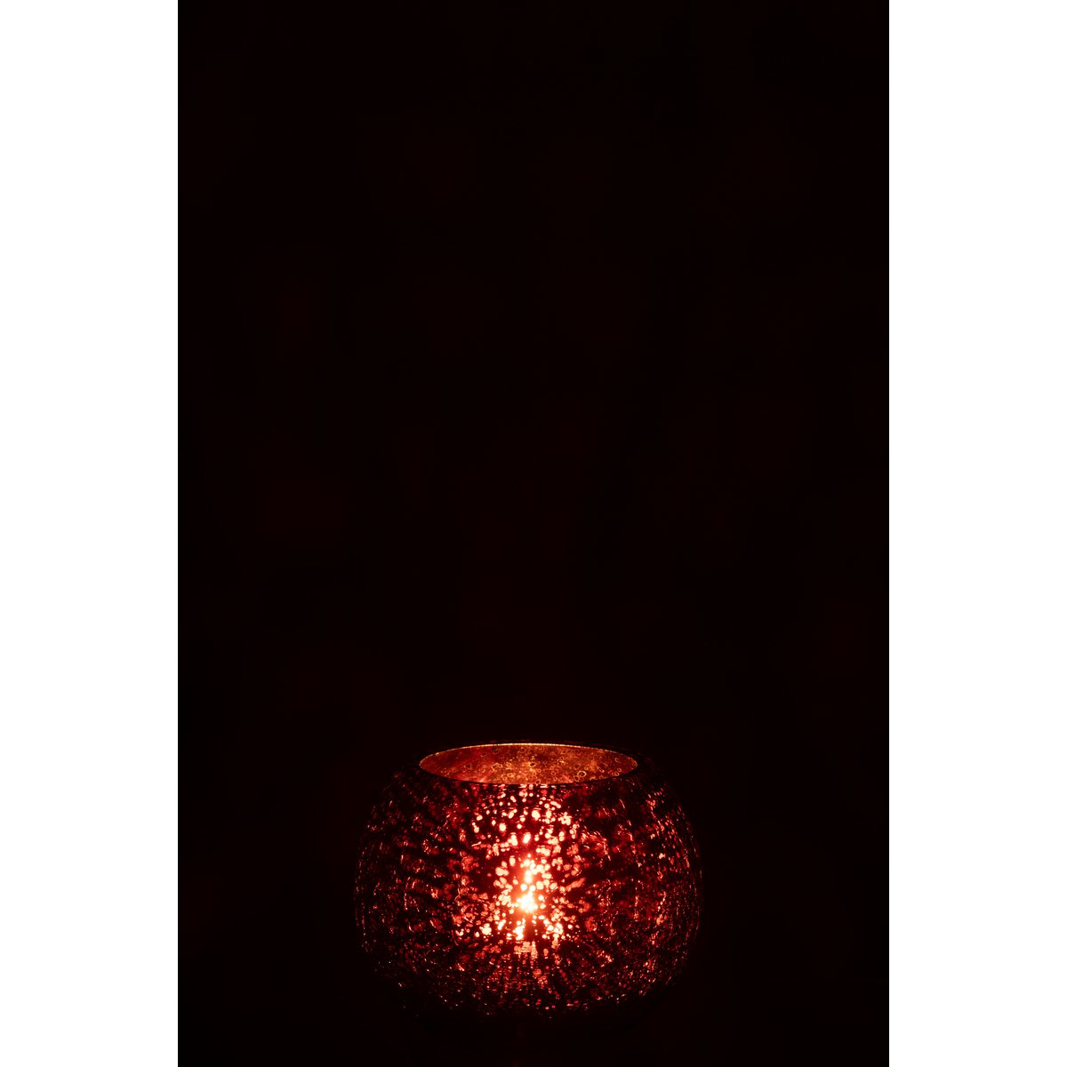 Photophore Boule en Verre Rose sur une table décorée