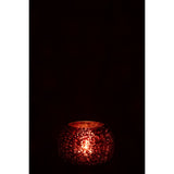 Photophore Boule en Verre Rose sur une table décorée