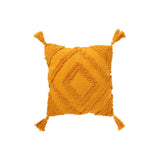Coussin J-Line sur un canapé, ambiance chaleureuse