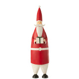 Figurine de Noël J-Line sur un fond décoratif, ambiance festive