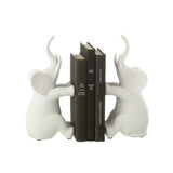 Serre-livres éléphant assis sur une étagère moderne - ambiance déco