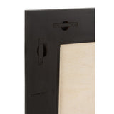 Miroir J-Line Molly Exotic noir accroché dans un salon élégant
