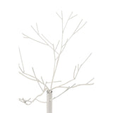 Arbre décoratif J-Line en métal blanc dans un salon moderne