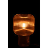Lampe J-Line allumée, ambiance chaleureuse dans un salon