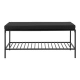 Banc Vita noir en acier avec siège rembourré dans une entrée moderne