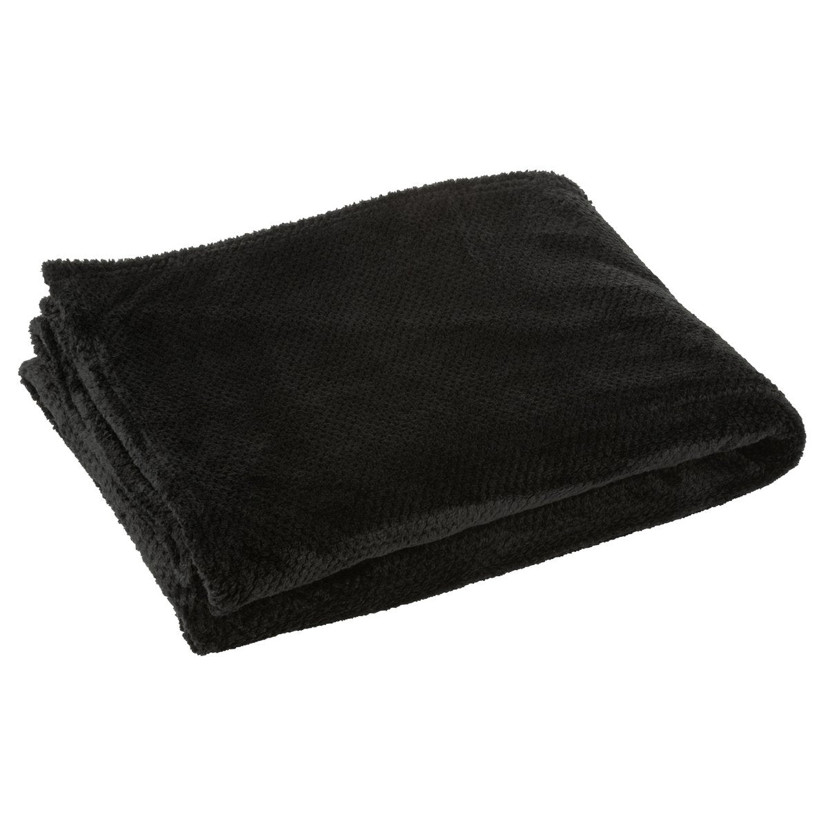 Ambiance cocooning avec la couverture J-Line Snuggle sur un lit
