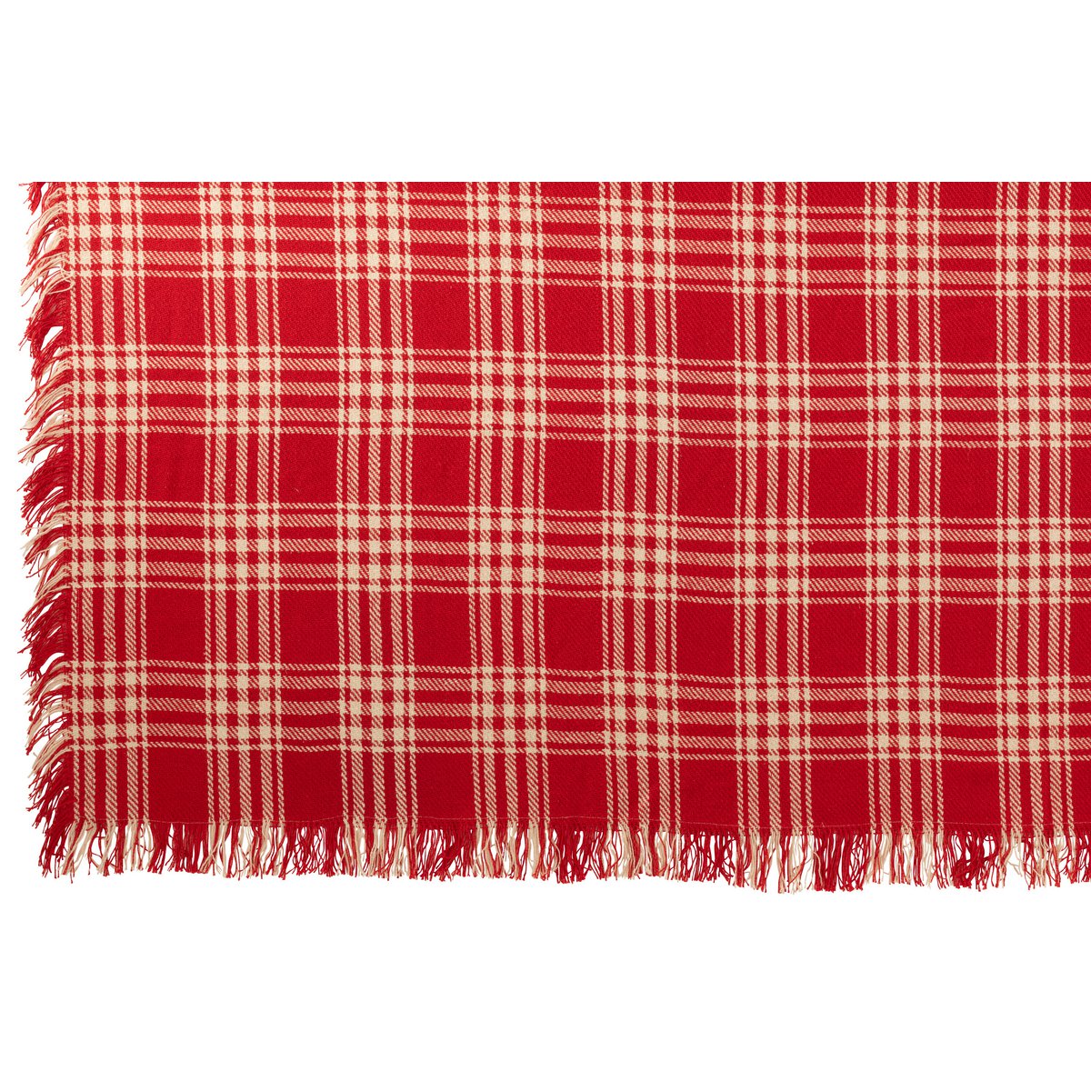 Plaid J-Line drapé sur un canapé élégant
