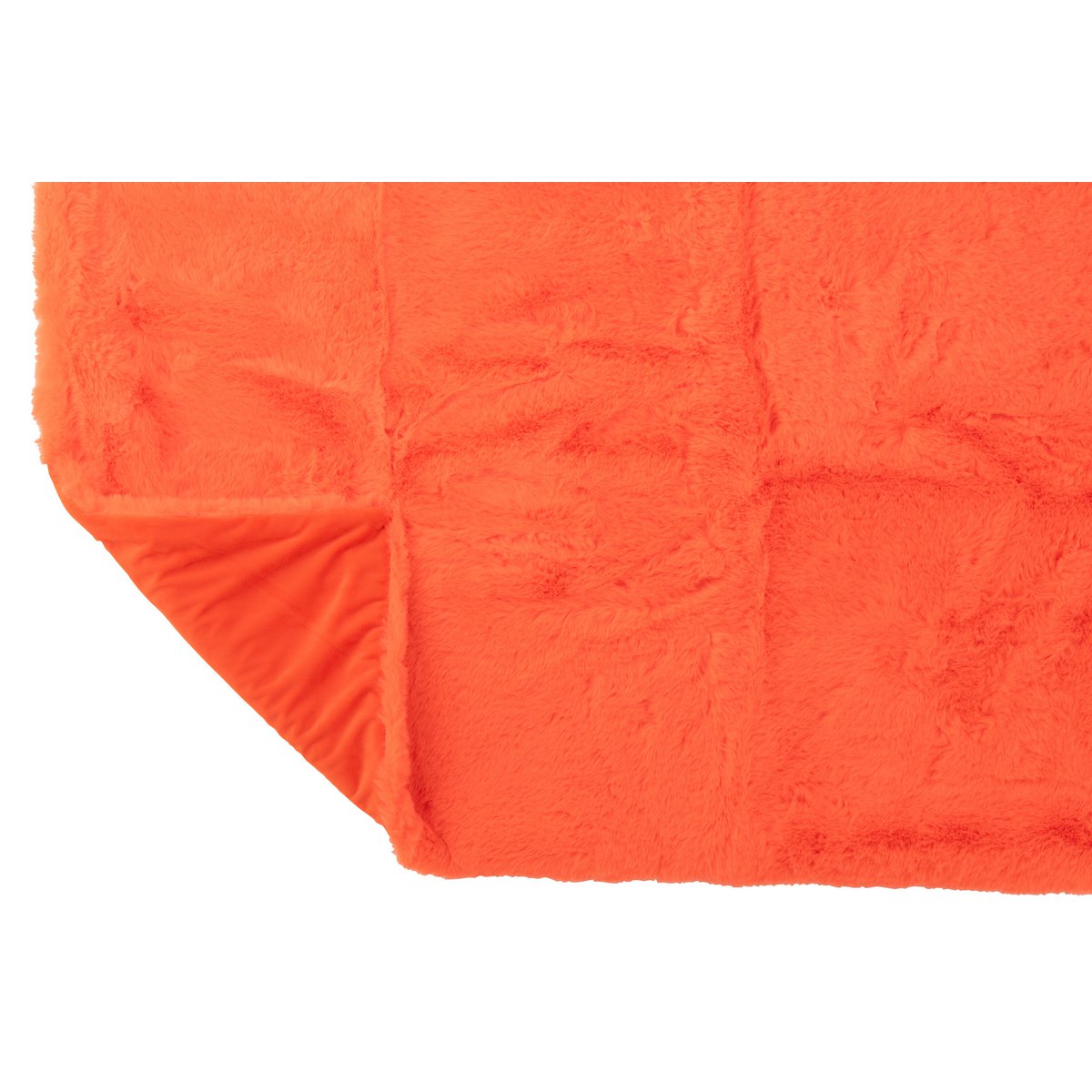 Couverture J-Line Cutie drapée sur un canapé moderne