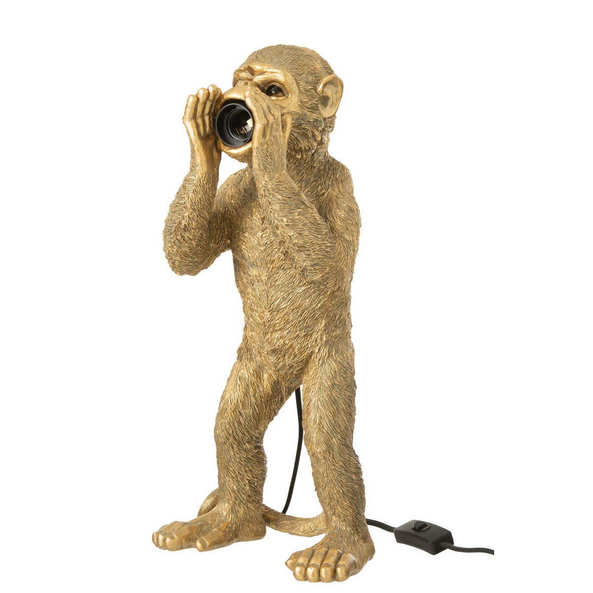 Lampe J-Line Monkey sur une table moderne, ambiance cosy