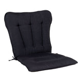 Coussin Cleveland noir sur chaise en bois dans un salon moderne