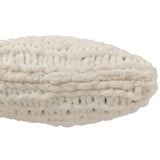 Coussin J-Line en coton blanc sur un canapé moderne