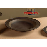 Bol East+West ULF04 sur une table élégante en bois