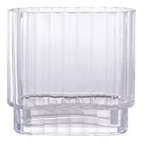 Vase en verre transparent avec des fleurs, vue de face