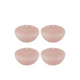 Bougie flottante J-Line rose, élégante et raffinée sur fond neutre.