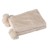 Détail du plaid Pompom en polyester beige avec texture douce