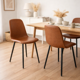 Chaise de salle à manger Stockholm - Marron, cuir PU, pieds en métal noir, 54x44x88cm - lot de 2 en situation