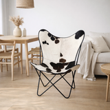 J-Line Chaise longue - peau de vache/métal - blanc/noir en situation