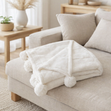 Pompon à carreaux J-Line - polyester - blanc - 170 x 130 cm en situation
