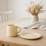 Tasse + soucoupe J-Line - céramique - jaune en situation