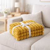 J-Line Plaid velours côtelé - polyester - ocre - 180 x 130 cm en situation