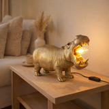 Lampe de table J-Line Hippopotamus - polyrésine - or en situation