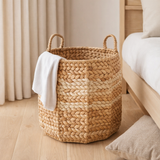 Grand panier à linge panier de rangement panier décoratif panier rond panier WAYAG en jacinthe d'eau tissée avec motif zigzag beige et marron en situation